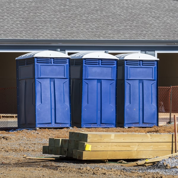 what is the cost difference between standard and deluxe portable toilet rentals in Crawfordsville